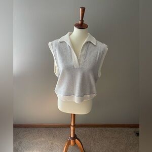 From an online boutique. Cute cream with black stripe.